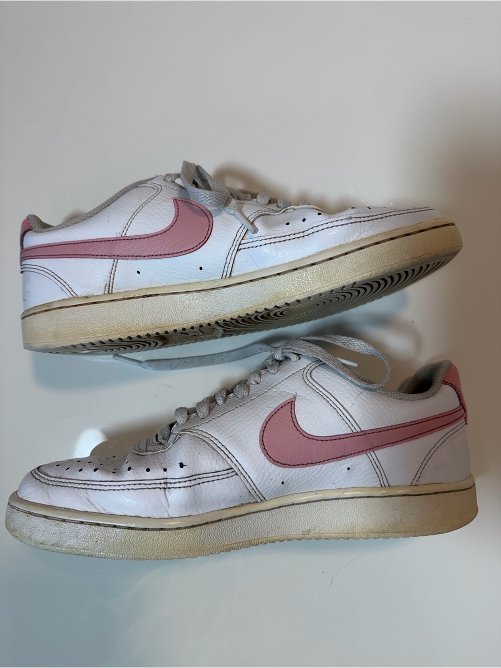Nike Men’s White Leather Sneakers with Pink Swoosh